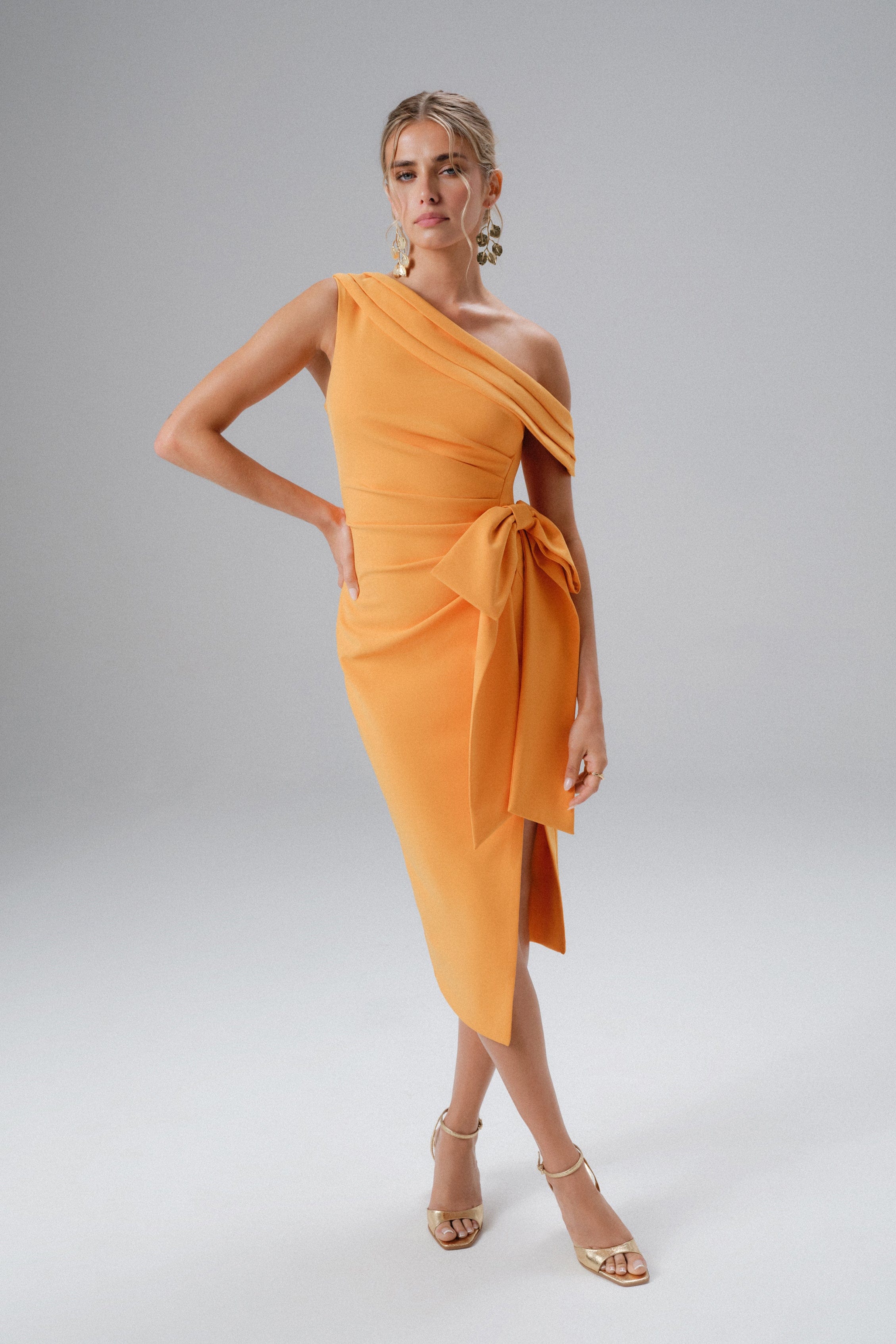 PRE-ORDER HONEY One Shoulder Pleated Bow Midi Dress in Orange