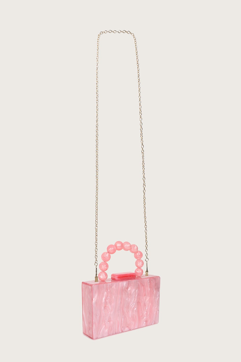 REYA Bead Handle Marbled Box Clutch Bag in Pink