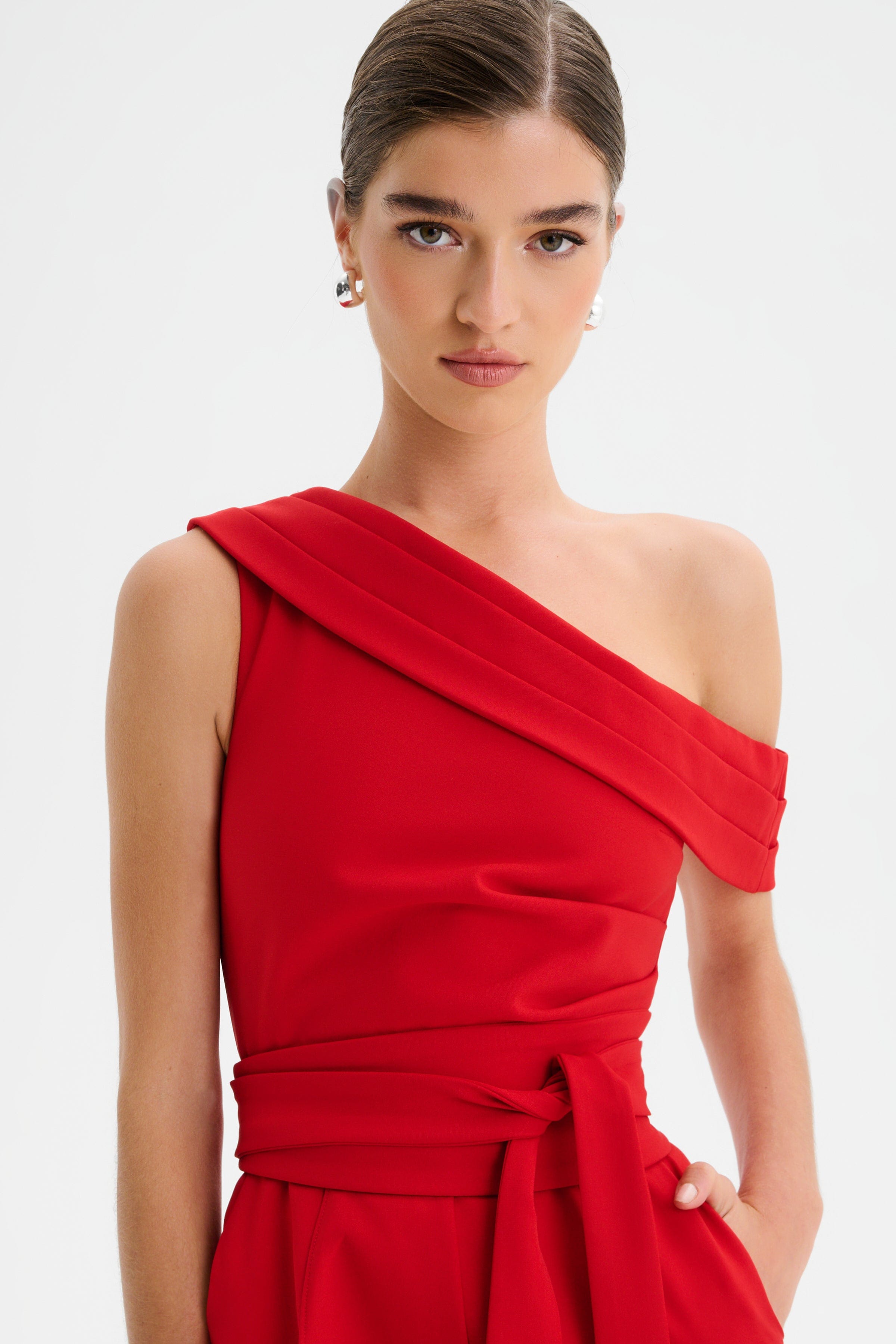 SOFIE Off Shoulder Pleated Obi Belted Jumpsuit in Red