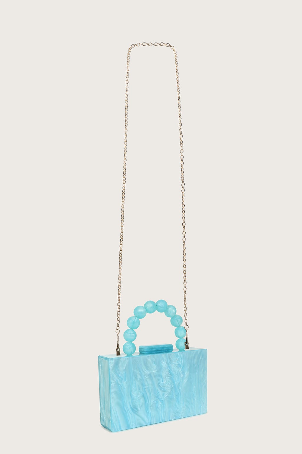REYA Bead Handle Marbled Box Clutch Bag in Blue